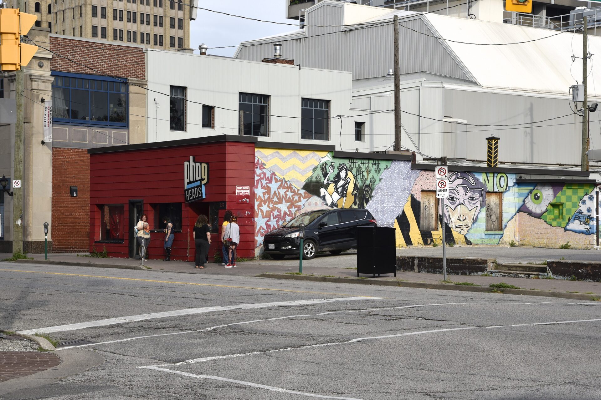 A downtown Windsor bar with colorful street art murals